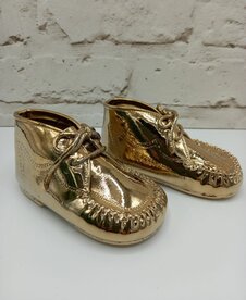 Kinderschoentjes vergulden