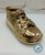 Kinderschoentje vergulden